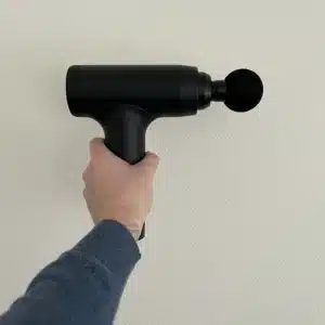 MusclePro massage gun in mijn hand