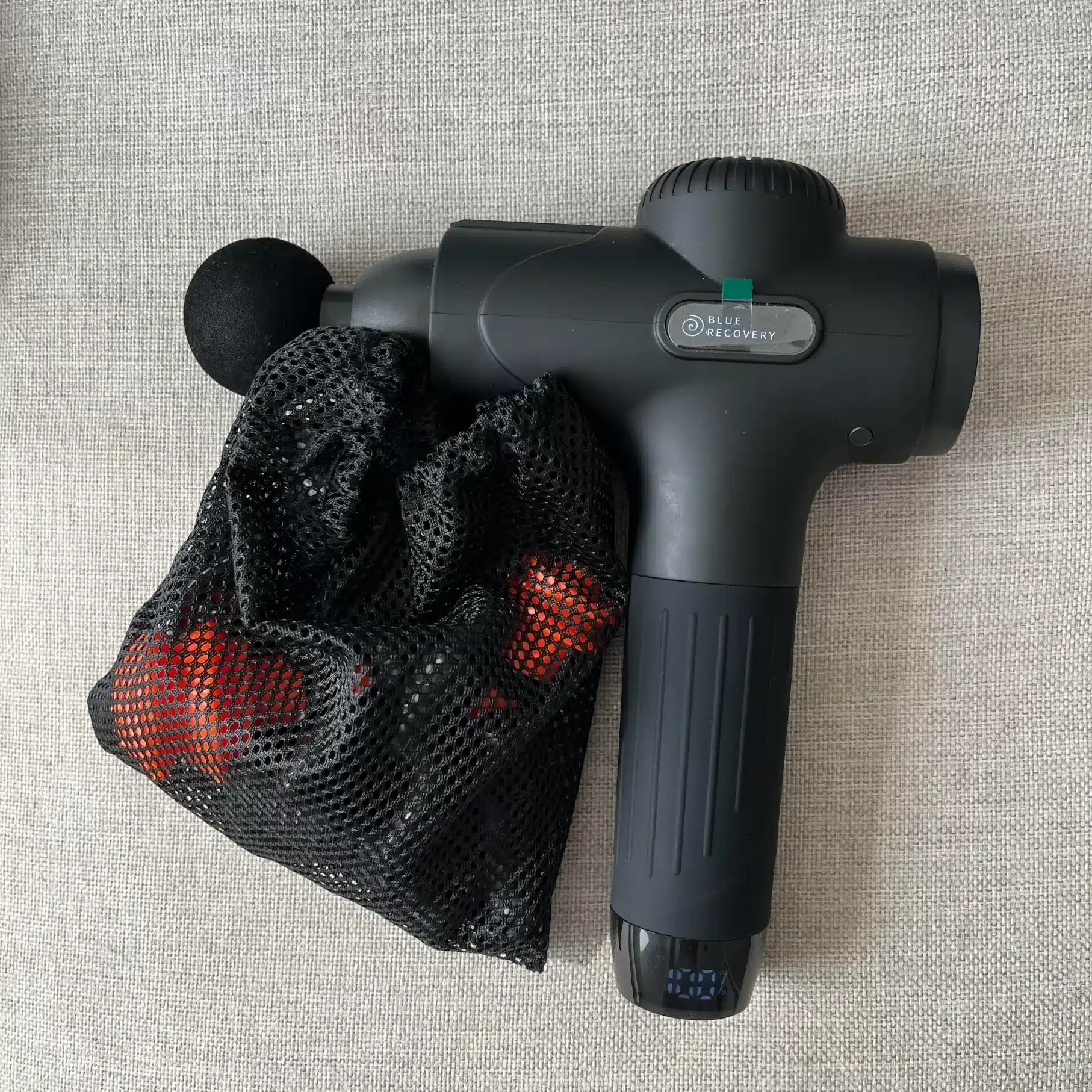 afbeelding van de blue recovery massage gun met de beste prijs kwaliteit verhouding